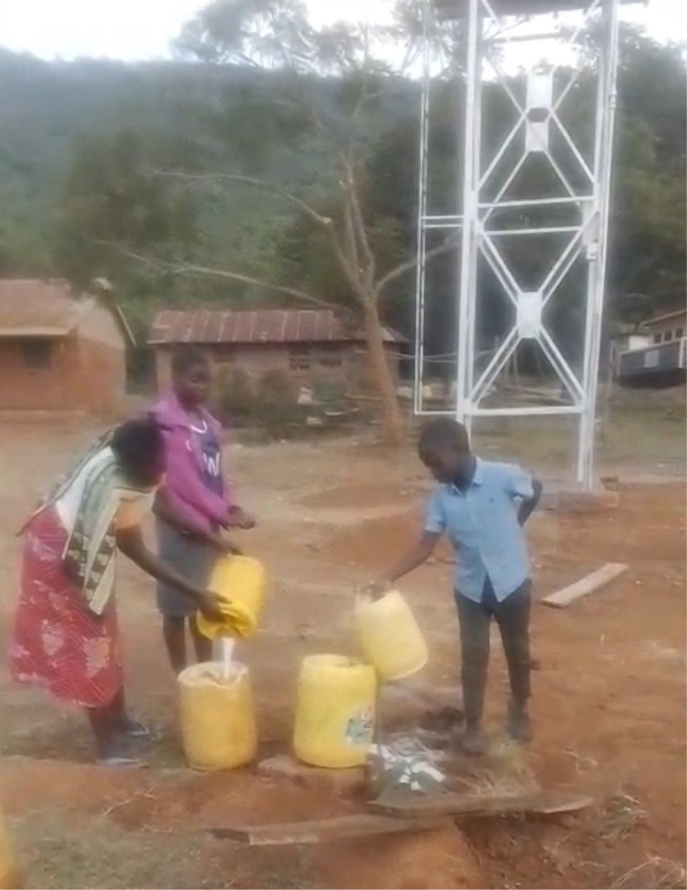 Women and children collecting water with ease.